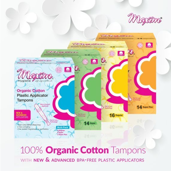 Maxim 100% organic cotton tampons collection showing multiple product boxes and sizes, featuring BPA-free applicators and colorful packaging, promoting chlorine-free, non-irritating period protection.