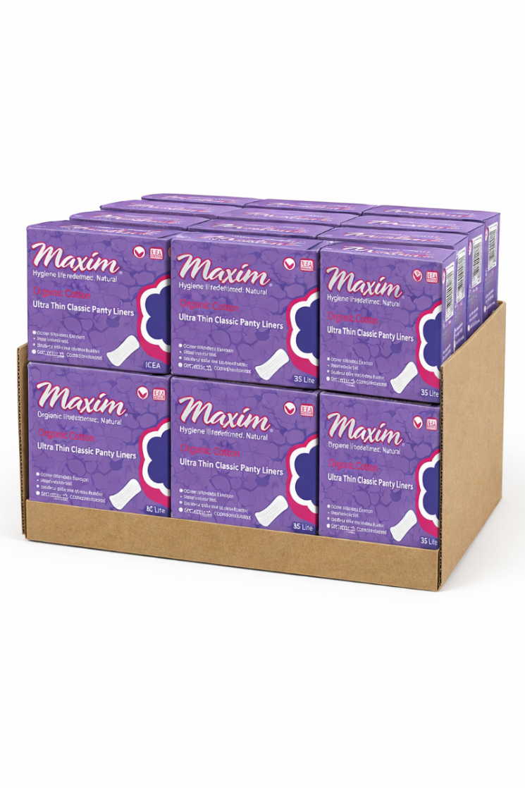 Display tray of Maxim organic cotton ultra-thin classic panty liners (35 lite) in purple boxes, bulk pack for retail shelf or store display.