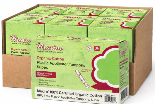 Case pack of Maxim organic cotton plastic applicator tampons (super, 14 count) in green boxes, featuring BPA-free applicator and claims of no chlorine bleaching, non-irritating, and no added fragrances or synthetics